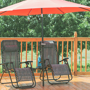 Peaceful RV sites surrounded by trees at Queen & Duke RV Resort in Whitesboro, Texas