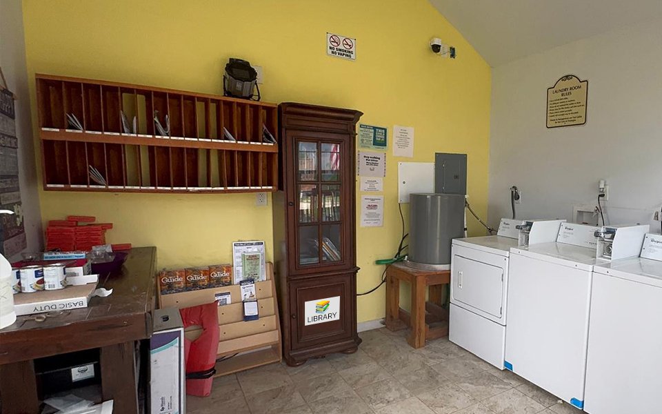 Peaceful RV sites surrounded by trees at Queen & Duke RV Resort in Whitesboro, Texas